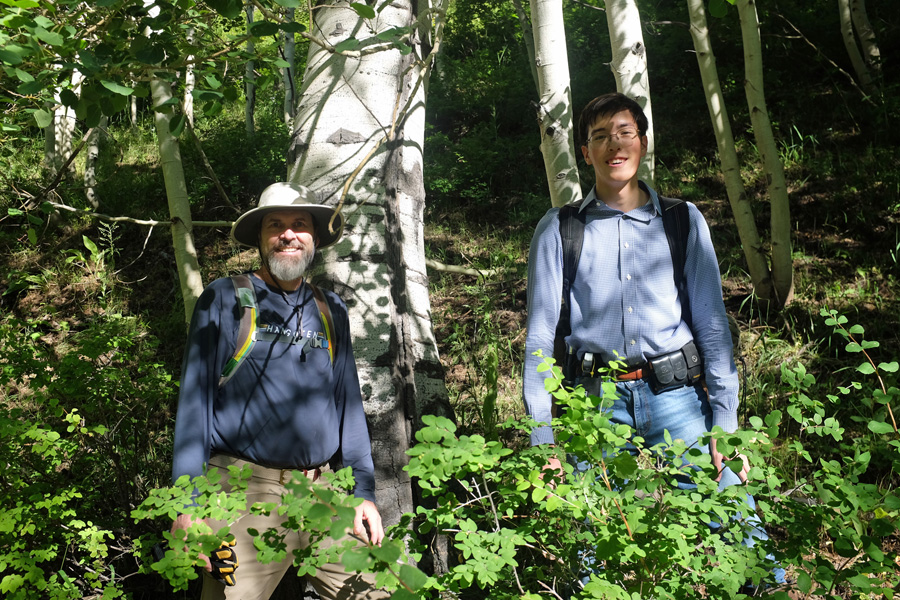 Bill and Steven taking a pause amoung aspen trees.